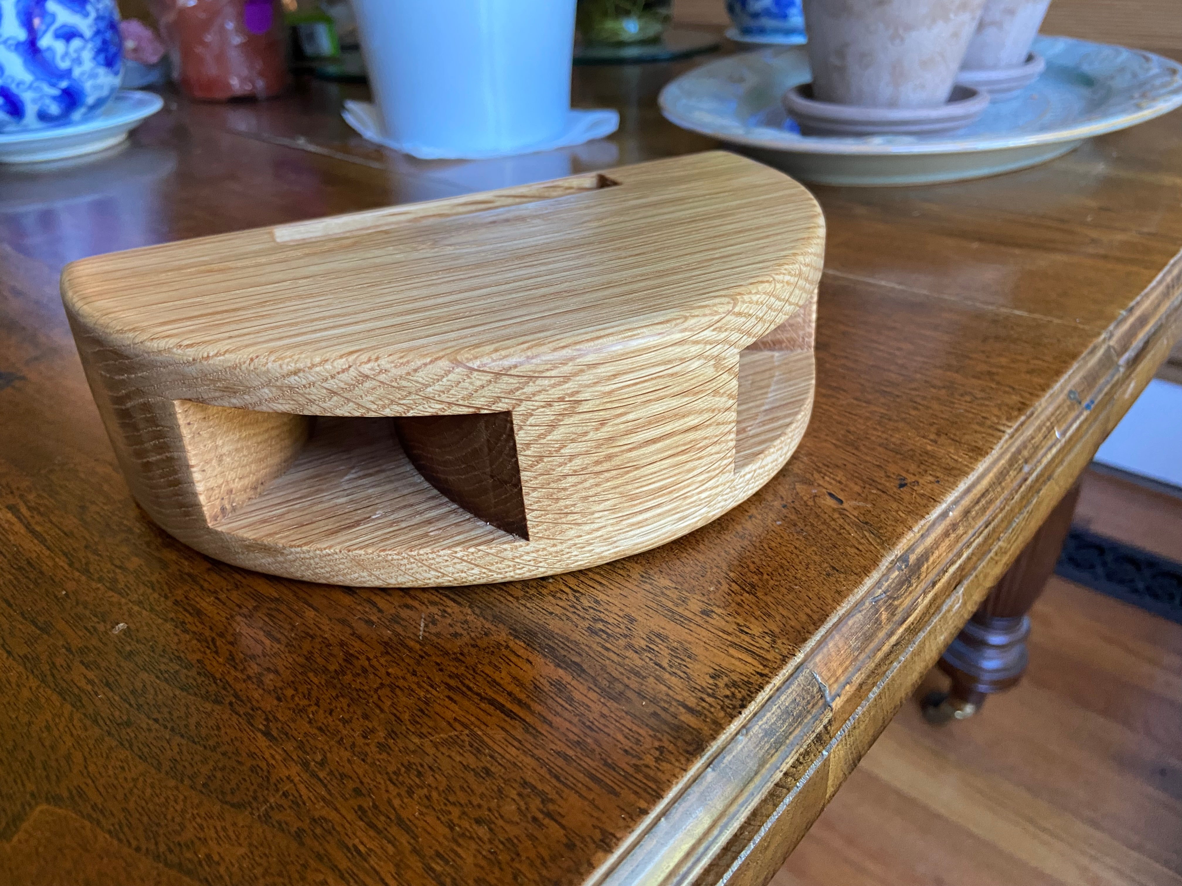 Handmade wooden smartphone speaker amplifier in Cherry, White Oak, and Mahogany finishes