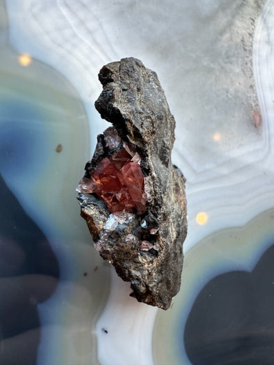 Close-up of rhodochrosite crystal cluster on natural matrix from Brazil