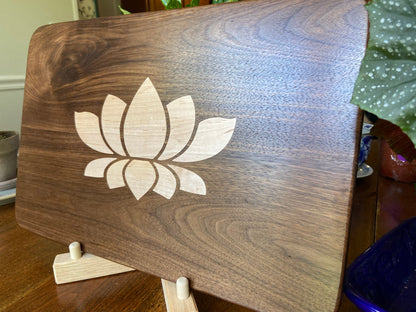 Walnut charcuterie board with lotus flower inlay made from soft maple wood