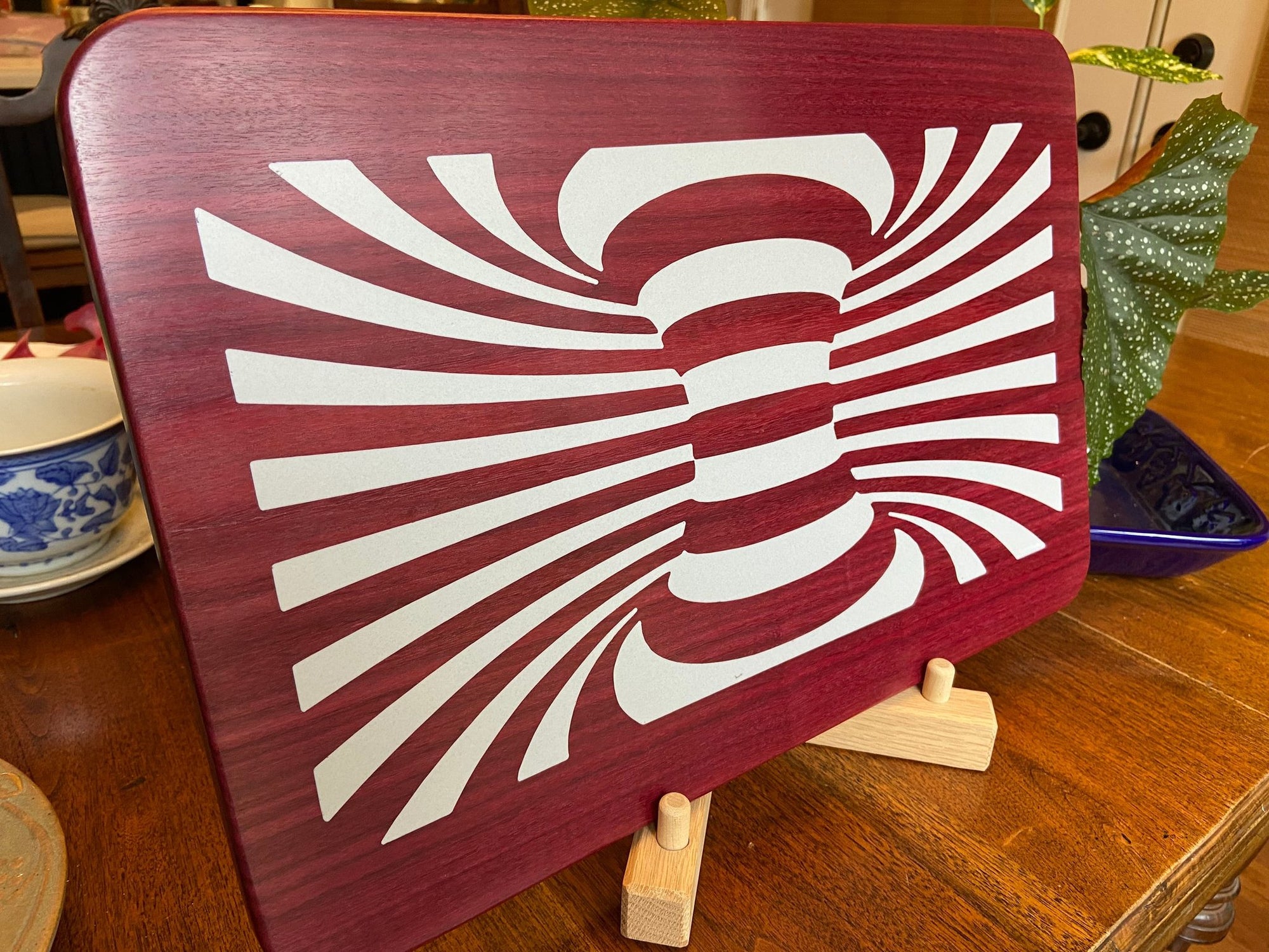 Purple Heart wood charcuterie board with resin worm hole inlay handcrafted by Fitzgerald Custom Woodcraft