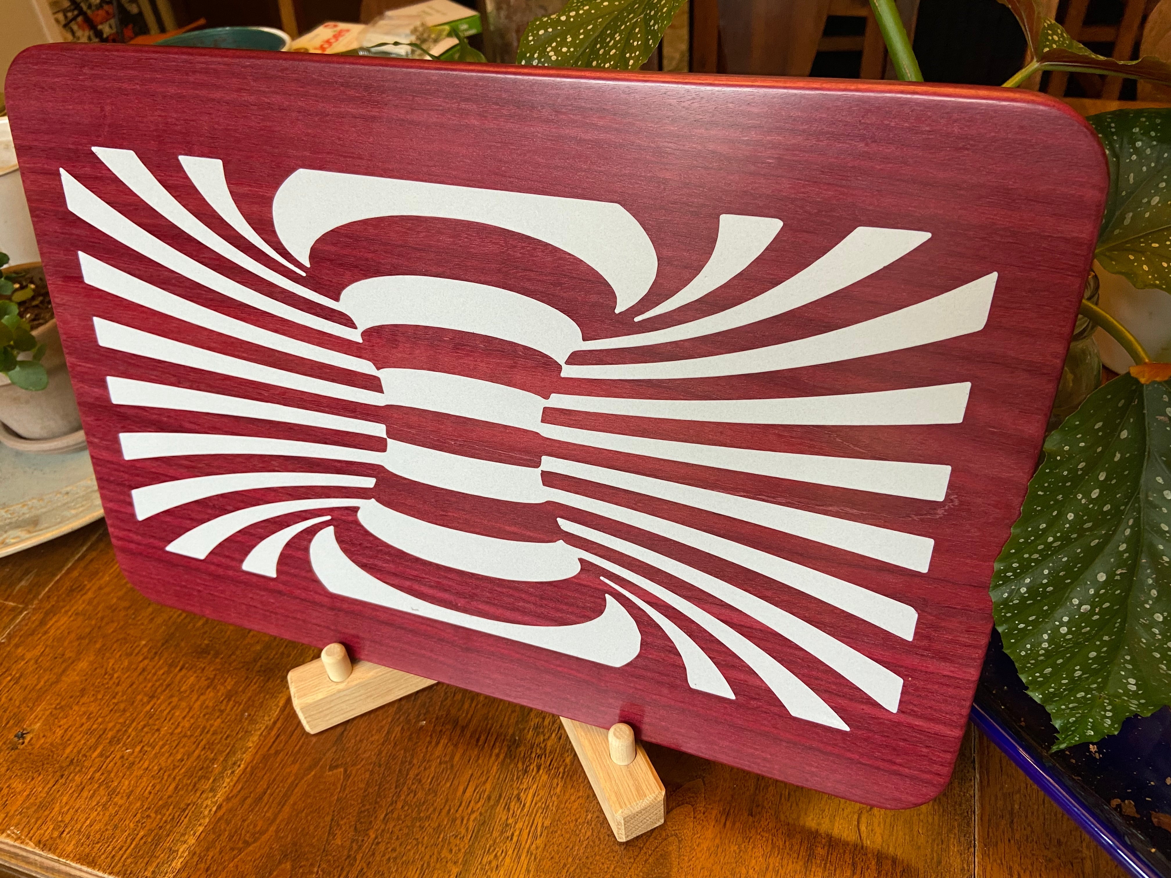 Purple Heart wood charcuterie board with resin worm hole inlay handcrafted by Fitzgerald Custom Woodcraft