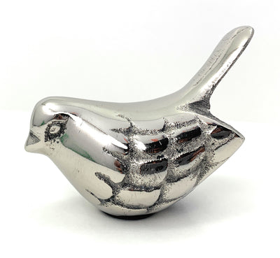 Silver rustic finish bird figurines from Vibhsa displayed on a wooden surface