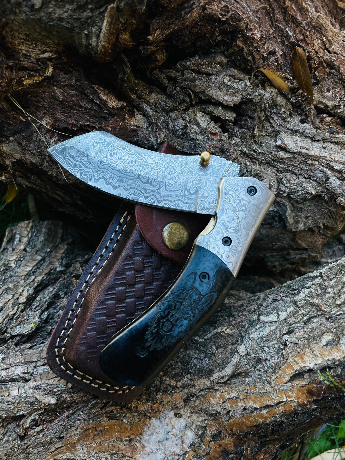 Damascus Steel Folding Knife Wolf Engraved TF-084 showcasing 4 inch patterned blade and Micarta handle