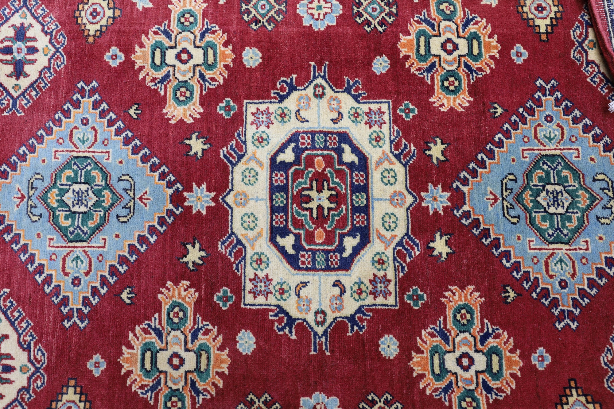 Hand-Knotted Afghani Kazak Wool Rug – 4’10″ x 6’6″ by Rugistan - product image 4 for Resin Society