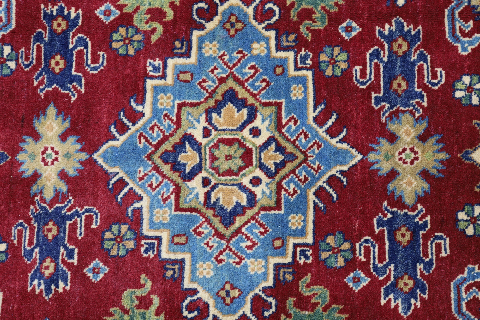 Hand-Knotted Afghani Kazak Wool Rug – 4’9″ x 6’8″ by Rugistan - product image 4 for Resin Society