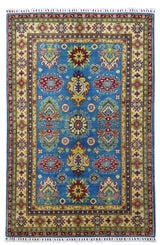 Rectangular Afghani Kazak wool rug with vibrant blue field featuring symmetrical red, yellow, and green geometric medallions framed by cream and red patterned borders with fringe ends.