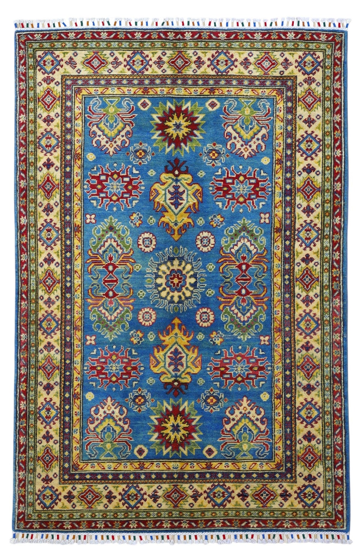 Rectangular Afghani Kazak wool rug with vibrant blue field featuring symmetrical red, yellow, and green geometric medallions framed by cream and red patterned borders with fringe ends.