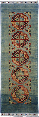 Hand-knotted Afghani Kazak wool rug in low green tones with geometric patterns displayed in natural light.