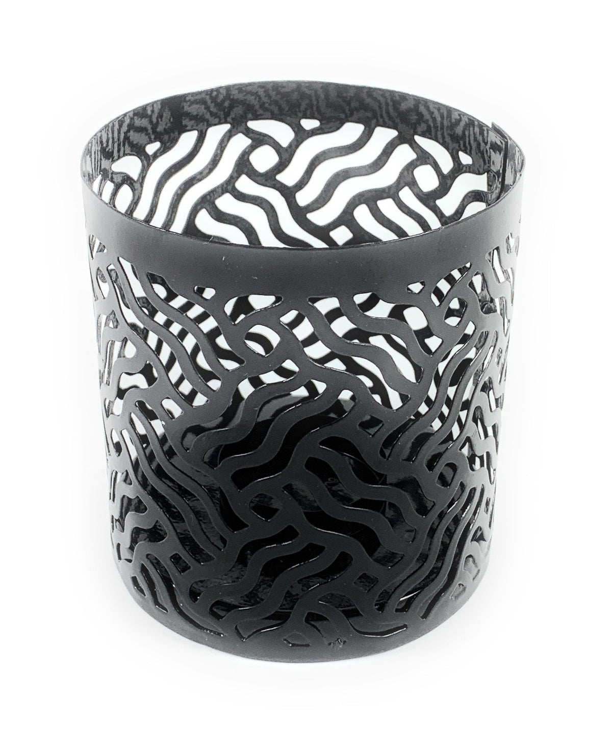 Black cylindrical votive candle holder with intricate wavy cutout pattern creating a textured, layered effect.