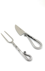 Designer Stainless Steel Carving Knife and Fork set displayed on a wooden surface