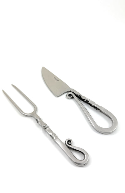 Designer Stainless Steel Carving Knife and Fork set displayed on a wooden surface