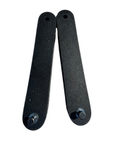 Pair of black ballistic rubber straps with mounting holes at one end and round-head screws attached at the other end, shown against a black background.