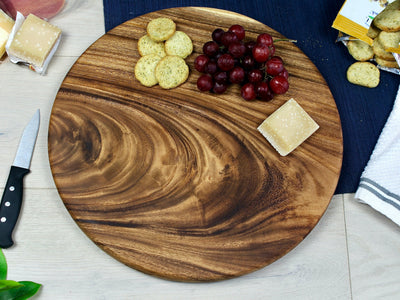 Medium Round Charcuterie Board made from East Indian Walnut by Tuckahoe Hardwoods.