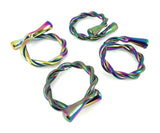 Set of four twisted metal napkin rings with a shiny rainbow finish, each featuring a cuffed end and a circular shape, displayed against a white background.