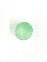 Small round translucent green bead with a central hole, displayed on a plain white background.