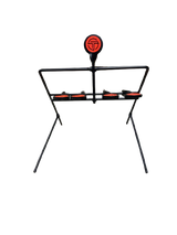 Black metal frame with four horizontal circular red reset targets and a single larger red centerfire target mounted centrally above them on a tripod stand.