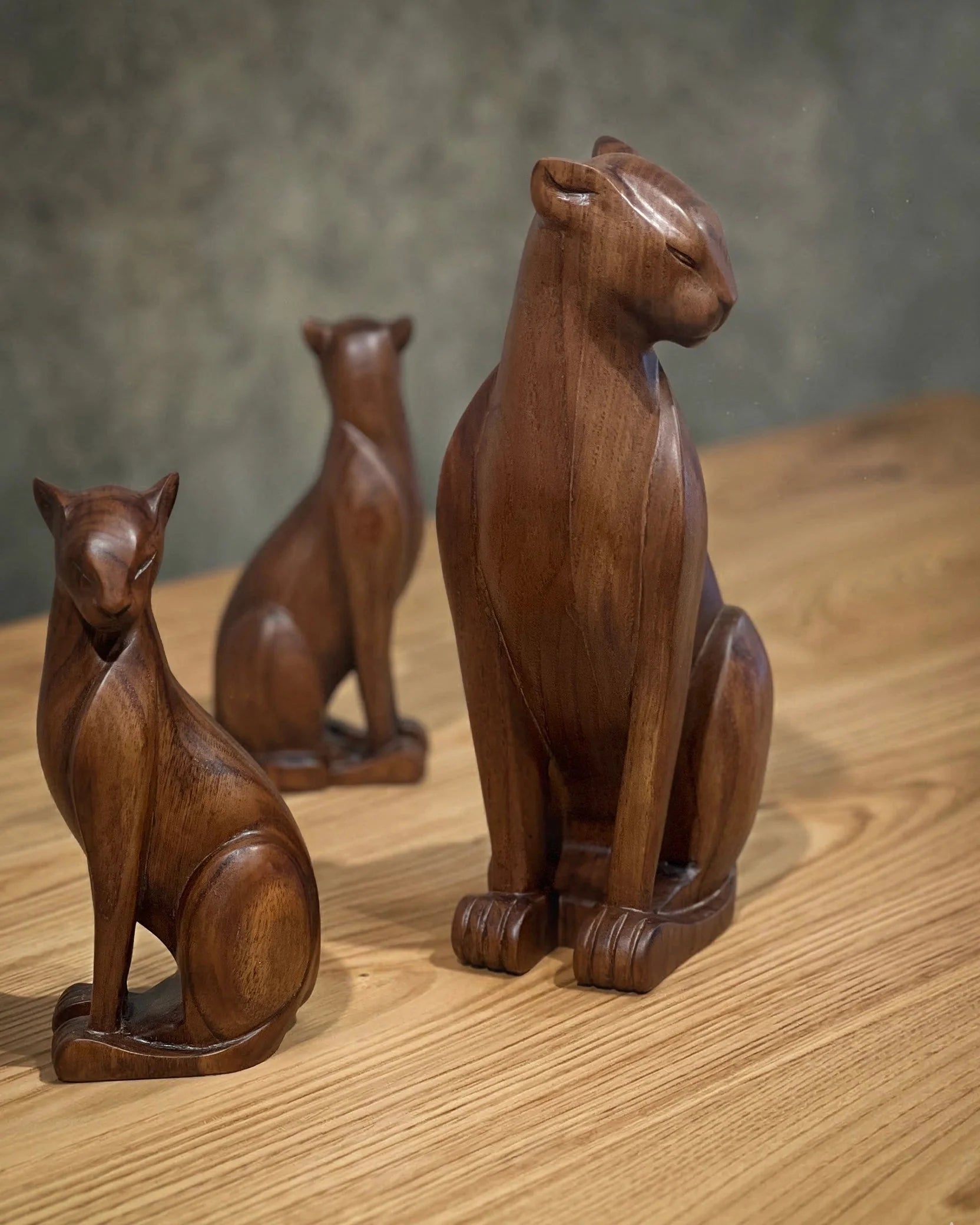 Handcrafted wooden wild cat figure in natural wood finish