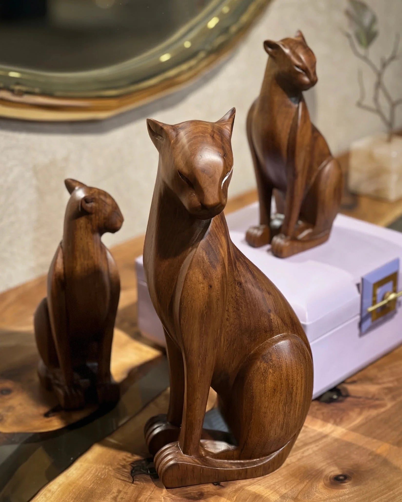 Handcrafted wooden wild cat figure in natural wood finish