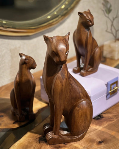 Handcrafted wooden wild cat figure in natural wood finish