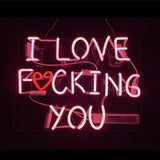 Pink I Love Fucking You neon sign illuminated on acrylic backing