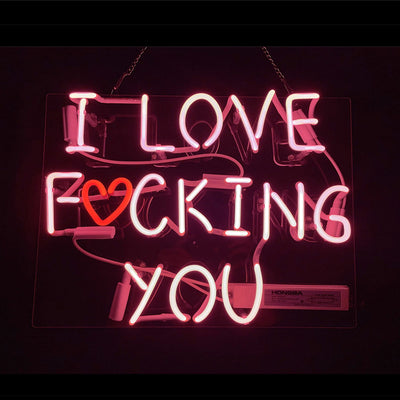Pink I Love Fucking You neon sign illuminated on acrylic backing