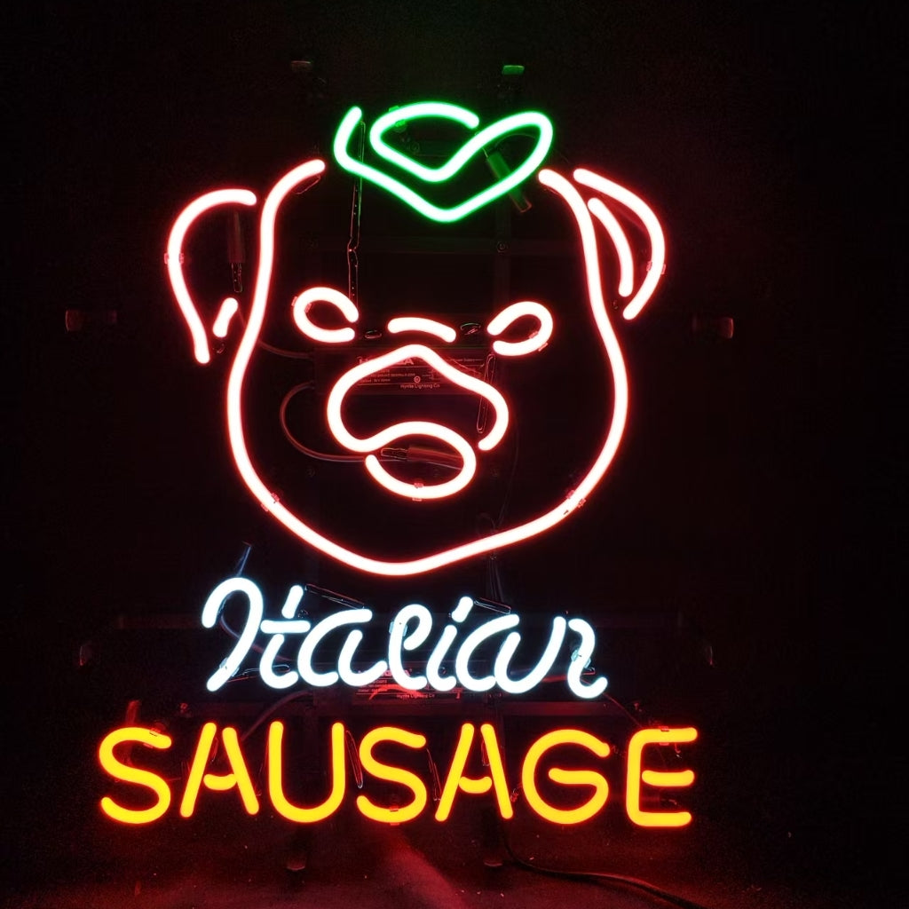 Neon sign displaying a pig's face in red with a green leaf on its head, above white cursive text 'Italian' and yellow block text 'SAUSAGE'.