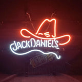 Neon sign featuring a red cowboy hat outline above glowing white cursive text reading 'Jack Daniel's' with a faint image of a Jack Daniel's bottle below, set against a dark background.