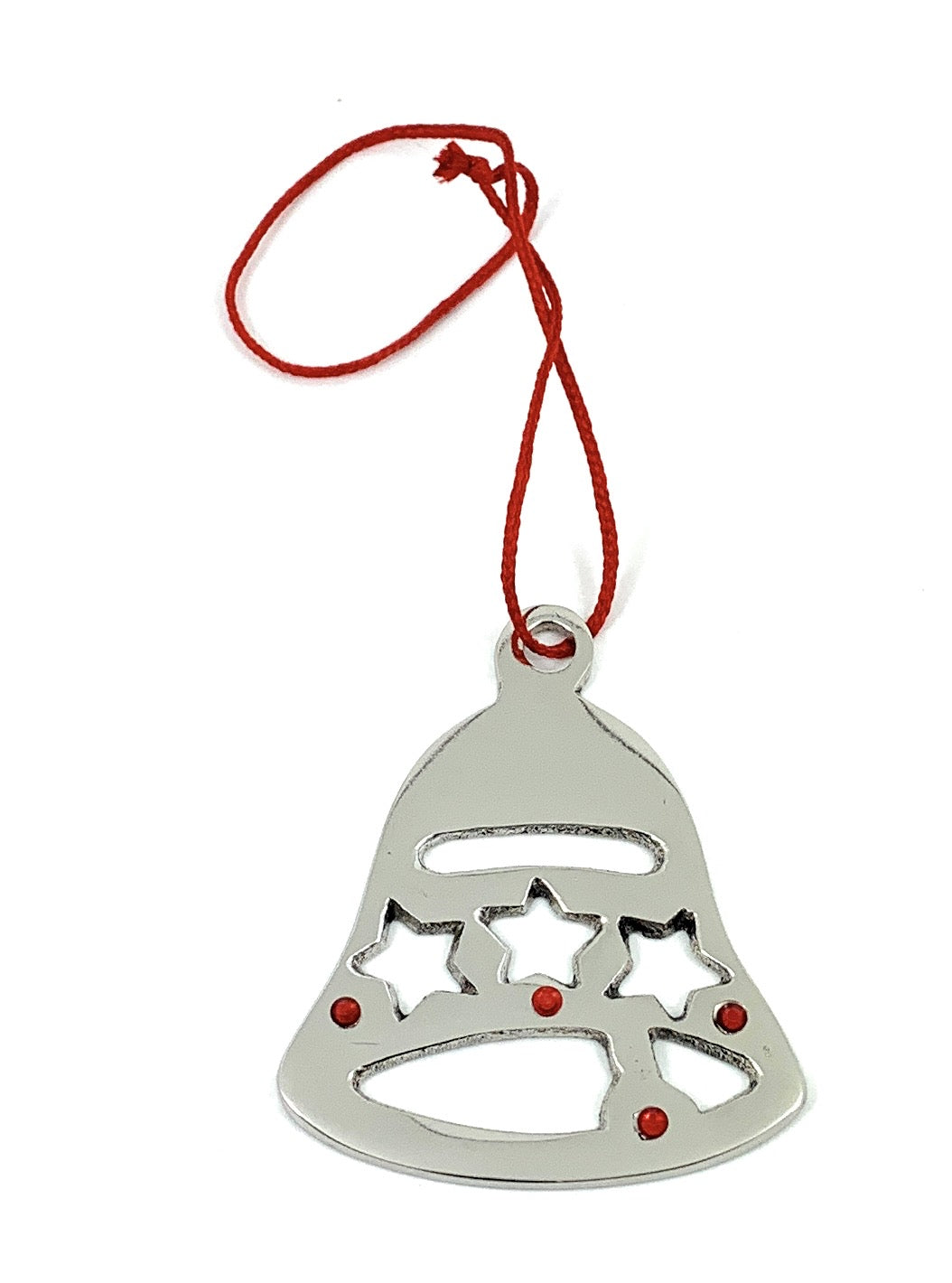 Set of eight silver jingle bell Christmas tree ornaments with red ribbons hung on branches