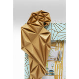Geometric parrot sculpture with faceted, angular surfaces in a golden-brown finish displayed inside a picture frame with light blue and gold linear pattern.