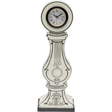 Table Clock Favola 9x26cm showing black and white 2-D art with vintage flea market style on a coastal wall