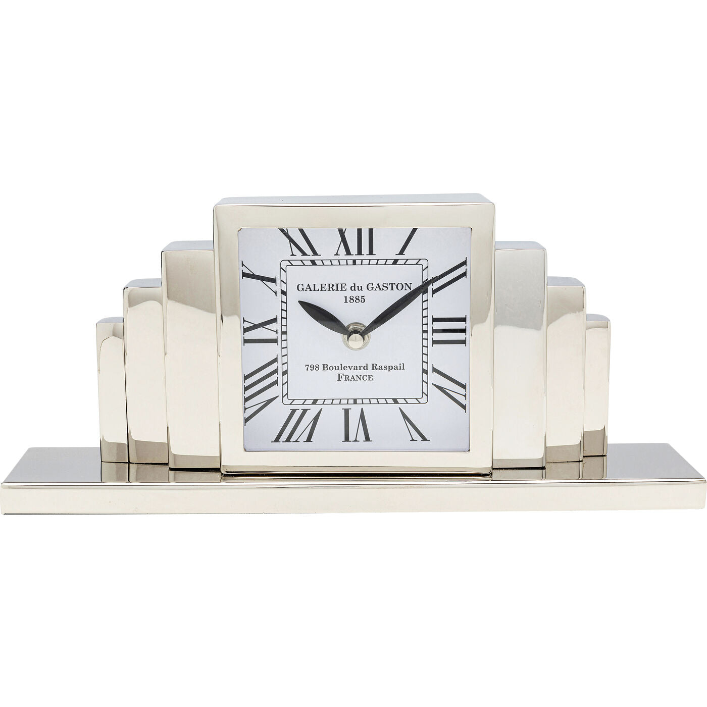 Rectangular table clock with nickel-plated steel body and black-and-white dial resting on a wooden surface