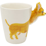 White ceramic mug featuring a brown dog body painted on the side and a three-dimensional dog head as the handle.