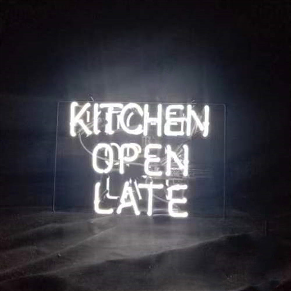 Kitchen Open Late Neon Sign glowing against a dark wall