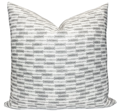 Lacuna Pillow Cover in Kohl front and back views showing dark printed fabric front and ivory linen back with zipper closure.