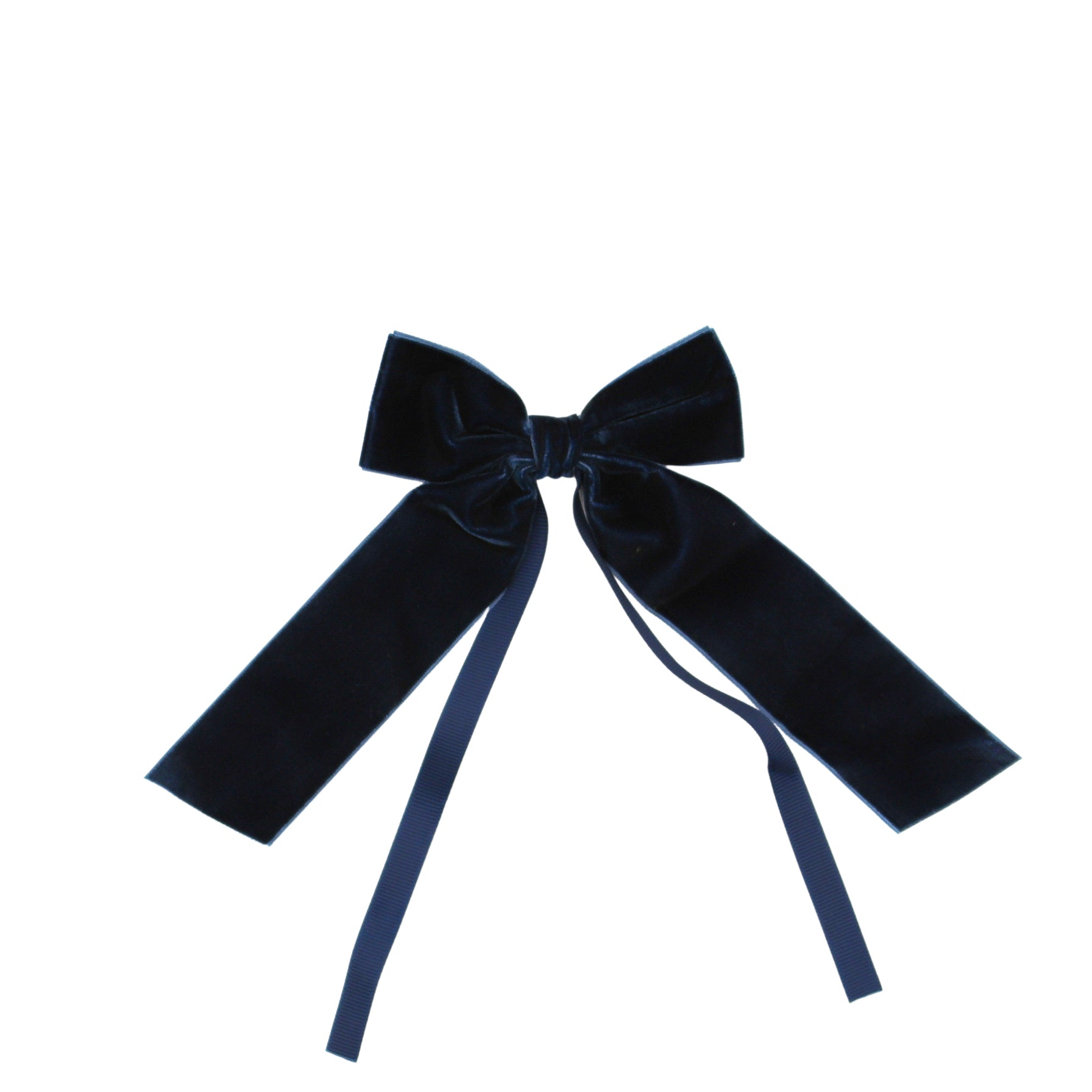 Set of six blue velvet napkin bow ties with attached blue ribbons arranged on a dark surface.