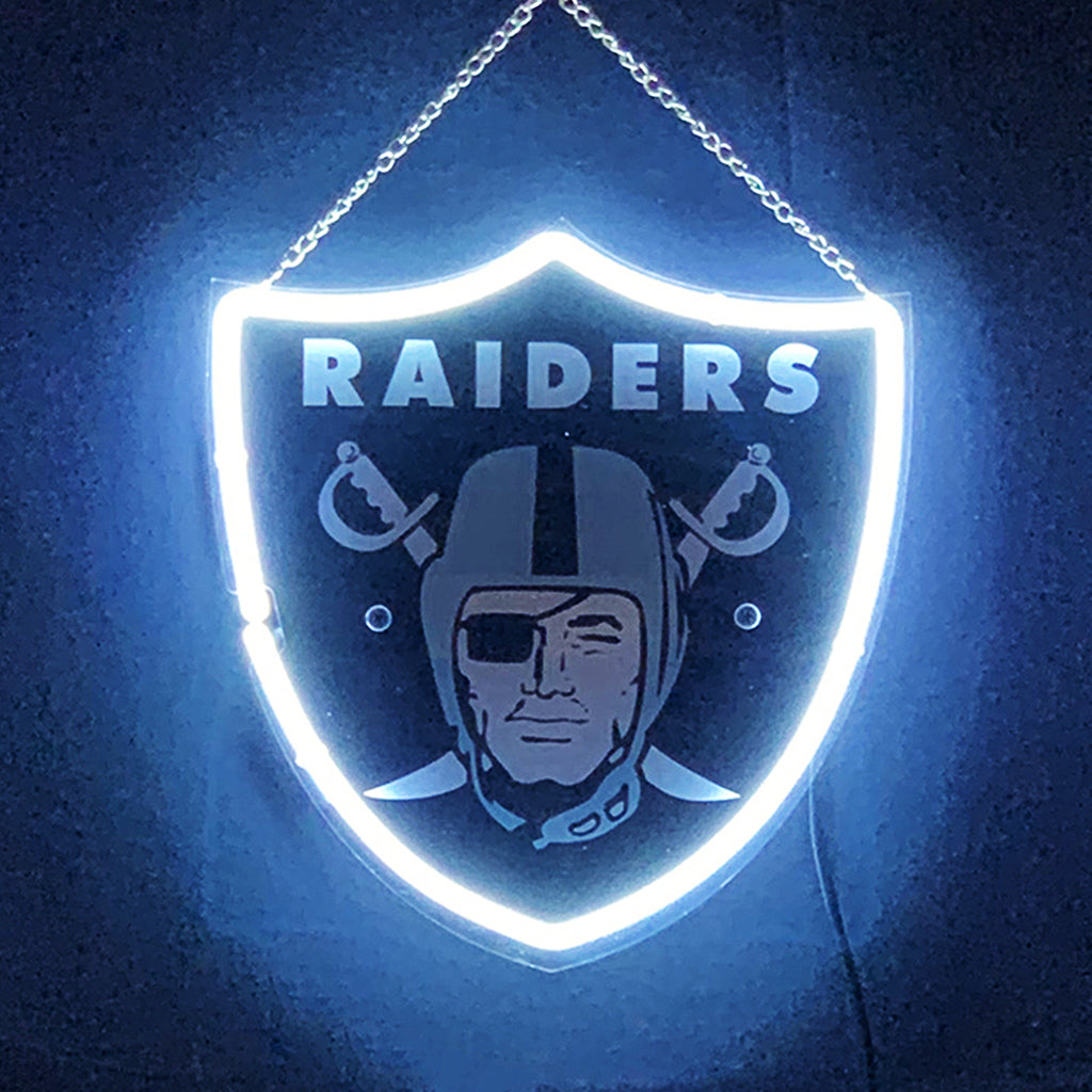 Las Vegas Raiders Acrylic Neon Sign glowing in dark indoor setting