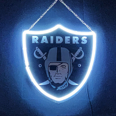 Las Vegas Raiders Acrylic Neon Sign glowing in dark indoor setting