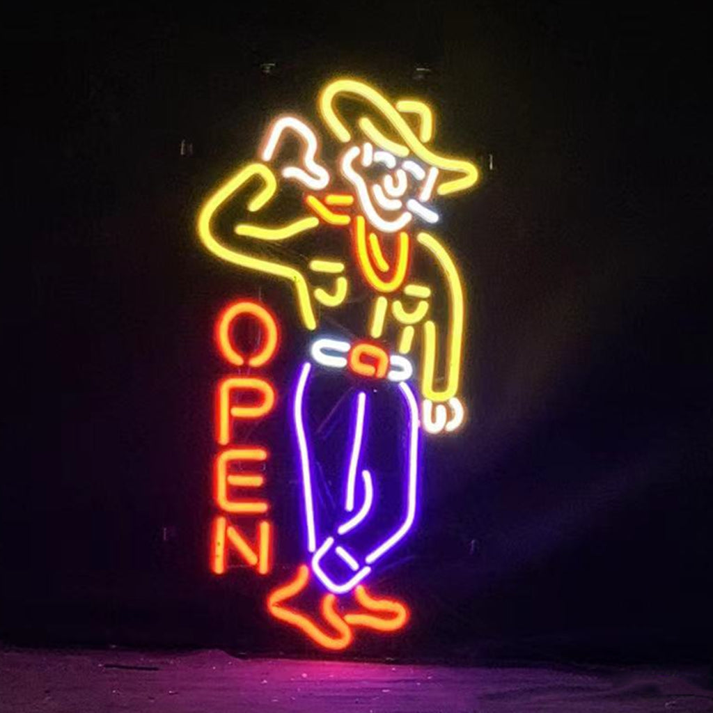 Las Vegas Cowboy Open Neon Sign glowing with vibrant colors on metal grid backing