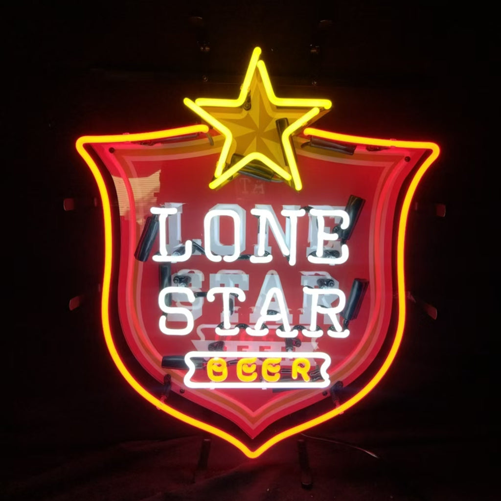 Neon sign shaped like a shield with a yellow star on top, red and orange outline, and white letters spelling 'LONE STAR' with 'BEER' below in yellow.