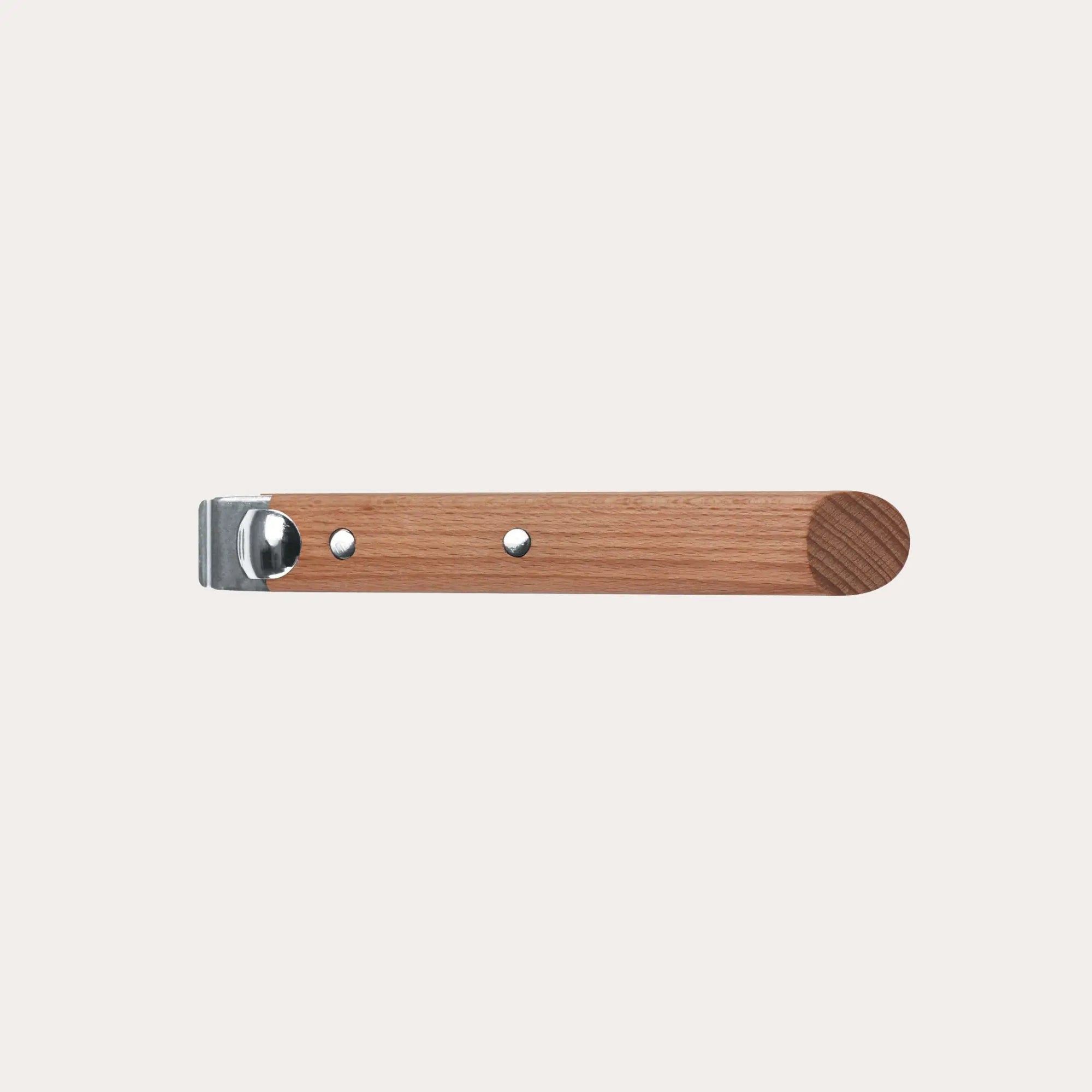 Wood Long Handle in walnut finish attached to CRISTEL cookware on kitchen countertop
