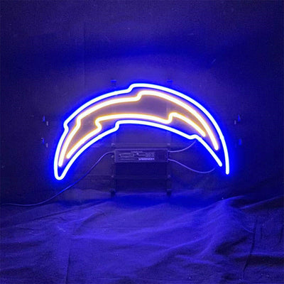 Los Angeles Chargers Neon Sign illuminated in a room setting, featuring electric bright blue and yellow colors on metal grid backing.