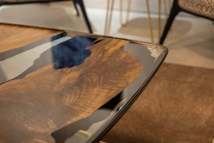 Ivory shaped epoxy resin coffee table made with walnut wood and aluminum legs