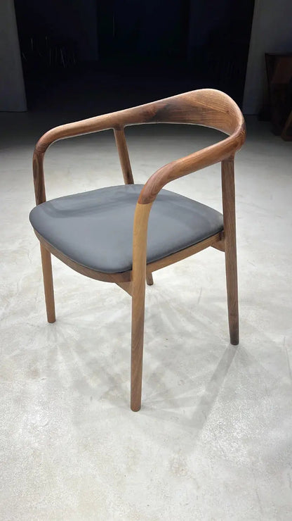 Luxury solid wood chair made of walnut with natural finish