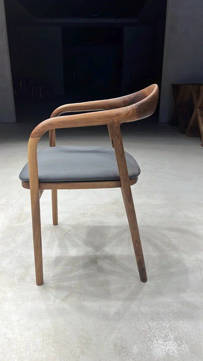 Luxury solid wood chair made of walnut with natural finish