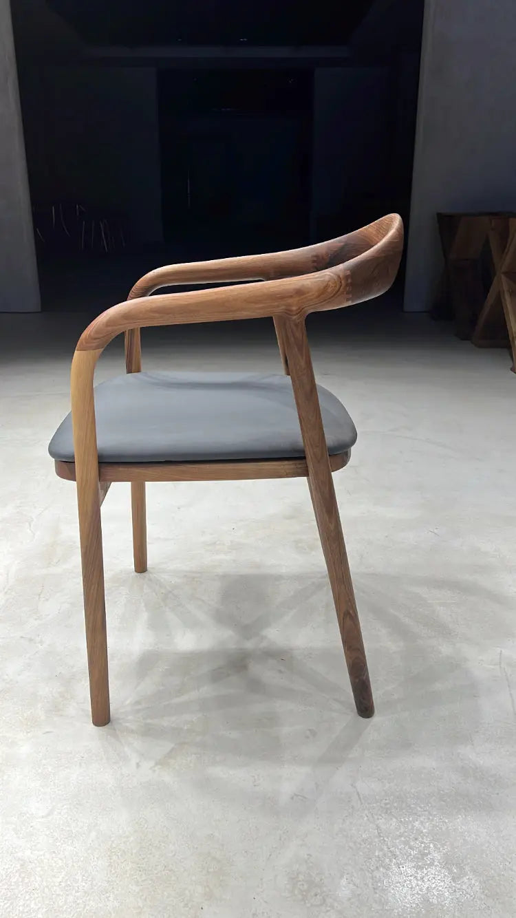 Luxury solid wood chair made of walnut with natural finish