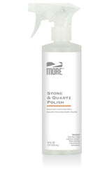 Bottle of MORE® Stone & Quartz Polish in front of a clean polished stone surface