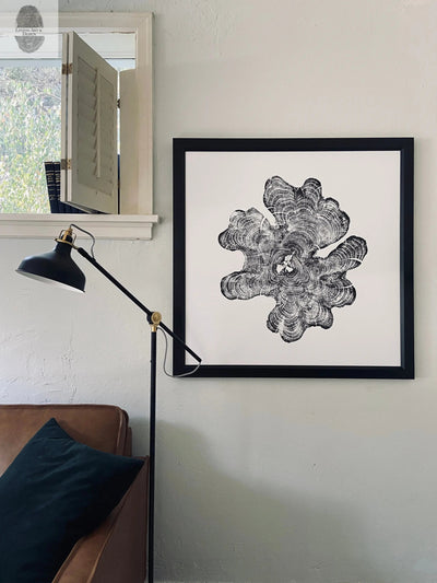 Hand-printed woodcut image of Maine cypress tree rings on large square paper