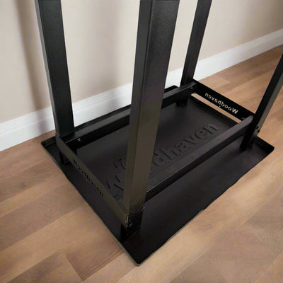 Woodhaven Multi-Purpose Firewood Rack Mat showing raised edges and waterproof surface