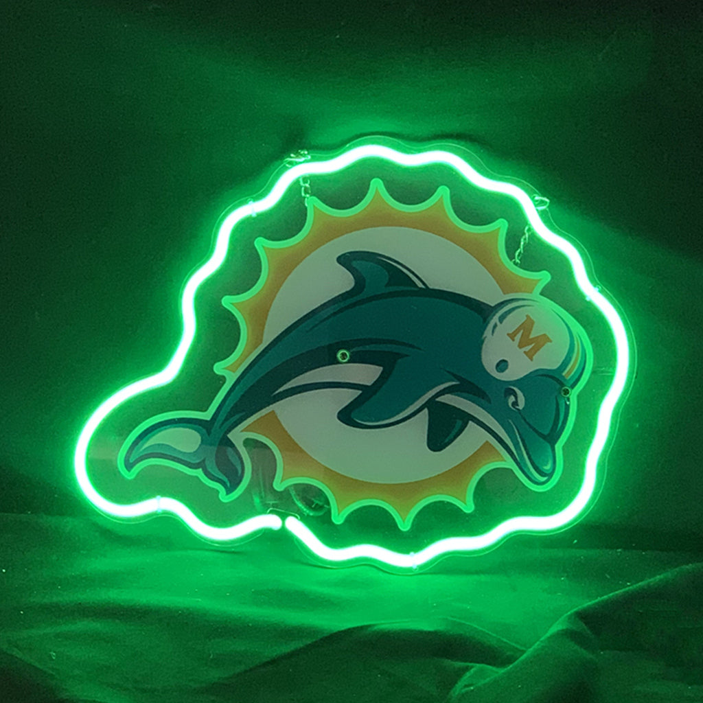 Neon sign featuring the Miami Dolphins logo with a teal dolphin wearing a white helmet with an orange 'M', outlined by a glowing green neon border resembling a sunburst.