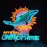 Neon sign of a teal dolphin with a yellow sunburst behind it and the text 'Miami Dolphins' in neon yellow and cyan letters below on black background.